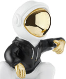 BRUBAKER Figurine Astronaut Sits on The Moon in a Cool Pose - 9.5 Inch Spaceman Space Decor Figure with Chromed Helmet and Black Hoodie - Hand Painted - Gold, Black and White