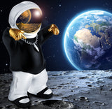 BRUBAKER Figurine Astronaut with Black Hoodie in Cool Pose - 8.3 Inch Spaceman Space Decor Figure with Chrome Plated Helmet and Silver Chain - Hand Painted - Gold, Black and White