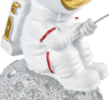 BRUBAKER Figurine Astronaut Sitting on The Moon Fishing for Stars - 6.7 Inch Spaceman Space Decor Figure with Fishing Rod and Chrome Plated Helmet - Hand Painted