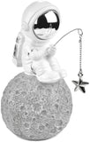 BRUBAKER Figurine Astronaut Sitting on The Moon Fishing for Stars - 6.7 Inch Spaceman Space Decor Figure with Fishing Rod and Chrome Plated Helmet - Hand Painted