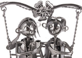 BRUBAKER Bottle Holder Wine - Heart with Couple on Swing - Romantic Metal Bottle Stand - Love Gift or Decoration Object - with Greeting Card