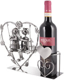 BRUBAKER Bottle Holder Wine - Heart with Couple on Swing - Romantic Metal Bottle Stand - Love Gift or Decoration Object - with Greeting Card