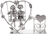 BRUBAKER Bottle Holder Wine - Heart with Couple on Swing - Romantic Metal Bottle Stand - Love Gift or Decoration Object - with Greeting Card