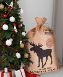 BRUBAKER Christmas Sack Special Delivery from the North Pole - 31.5 Inch Holiday Gift Bag - Jute Moose & Reindeer Design