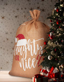 BRUBAKER Christmas Sack Naughty or Nice - 31.5 Inches Holiday Gift Bag - Santa Sack Made of Jute with Drawstring