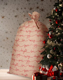 BRUBAKER Christmas Sack Love Peace Joy - 31.5 Inches Holiday Gift Bag - Santa Sack - Large Jute Sack in Brown & Red