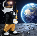 BRUBAKER Figurine Astronaut Guitarist with Electric Guitar - 9.5 Inch Spaceman Space Decor Figure with Black Hoodie and Chromed Helmet - Hand Painted - Gold, Black and White