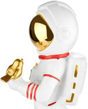 BRUBAKER Figurine Astronaut with Small Bird - 11.8 Inch Spaceman - Space Decor Figure with Chrome Plated Helmet - Hand Painted Modern Statue - Gold and White